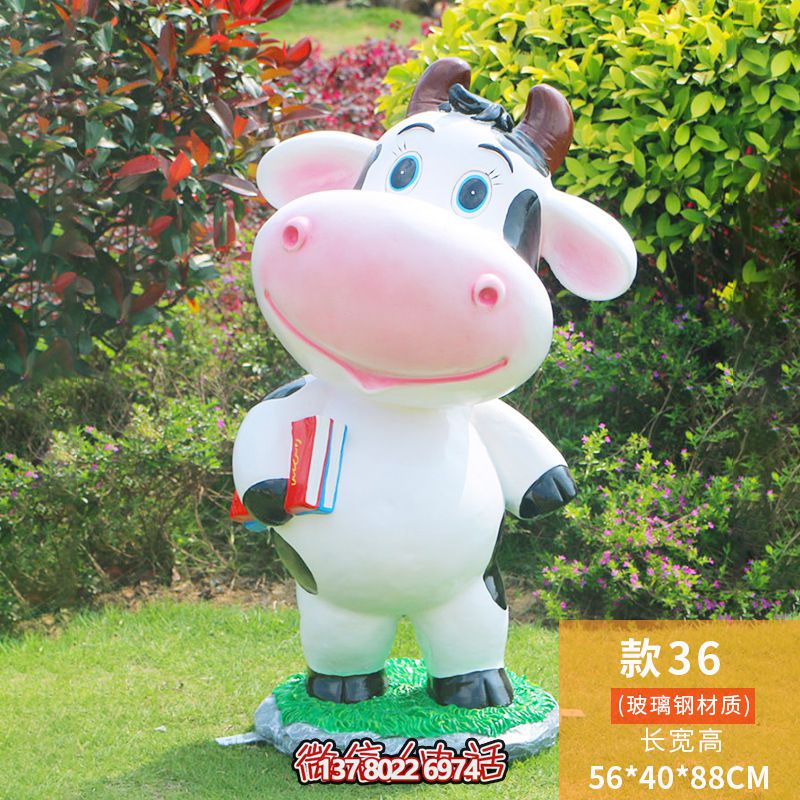 圖書館一只拿書的玻璃鋼牛雕塑 圖書館一只拿書的玻璃鋼牛雕塑