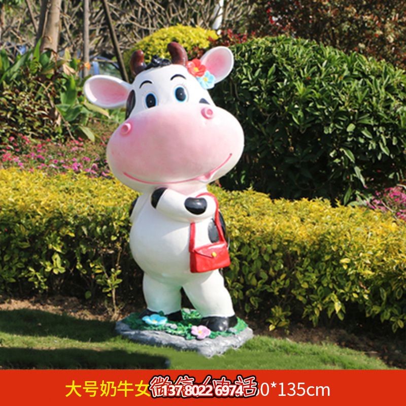 公園一只大號(hào)提包的玻璃鋼牛雕塑 公園一只大號(hào)提包的玻璃鋼牛雕塑